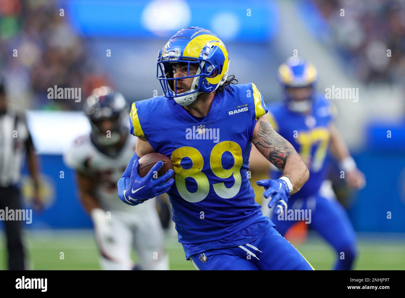INGLEWOOD, CA - DECEMBER 25: Los Angeles Rams tight end Tyler Higbee (89)  catches the ball for a gain during the NFL game between the Denver Broncos  and the Los Angeles Rams