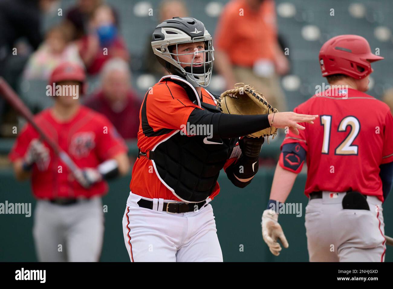 Bowie Baysox catcher Adley Rutschman (30) throws to first base after a