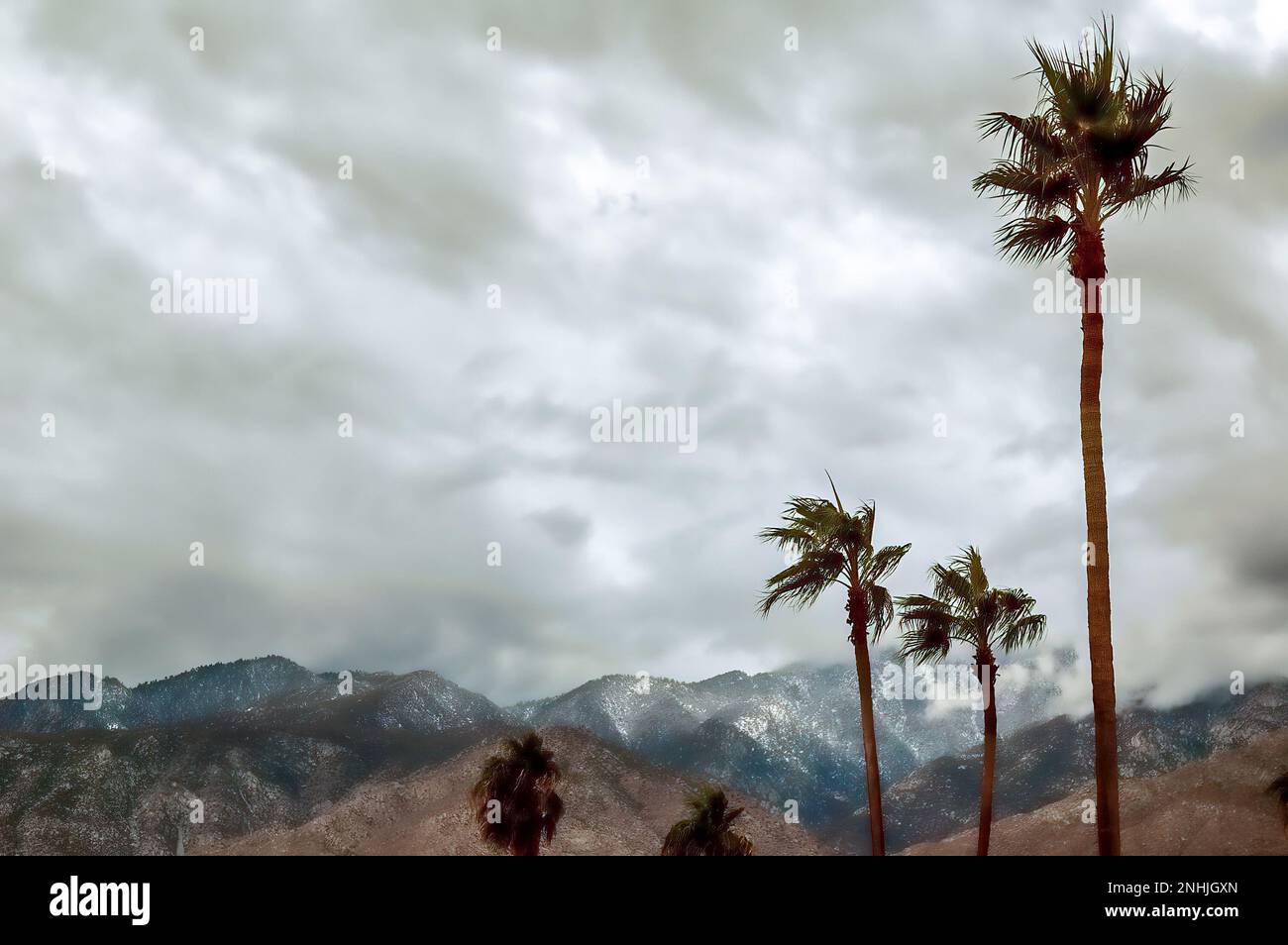 During the winter, it's not uncommon for fascinating clouds from the north to envelop Palm Springs. Stock Photo