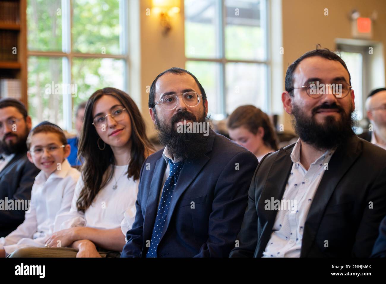 Friends and family members attend the awards ceremony of U.S. Army Air Corps 1st Lt. Gerald Teldon, retired, recognizing his honorable service as a pilot on July 29, 2022, at the Chabad Center for Jewish Life and Learning, San Antonio, Texas. Teldon, born in Bronx, N.Y., in 1924, joined the military in 1944. He completed 62 missions during WWII and the Korean War. Lt. Col. Andrew Stein, 502nd Operations Support Squadron commander, was the presiding officers. The awards presented to Teldon are as follows: the Air Medal; American Campaign Medal; European – African – Middle Eastern Campaign Medal Stock Photo