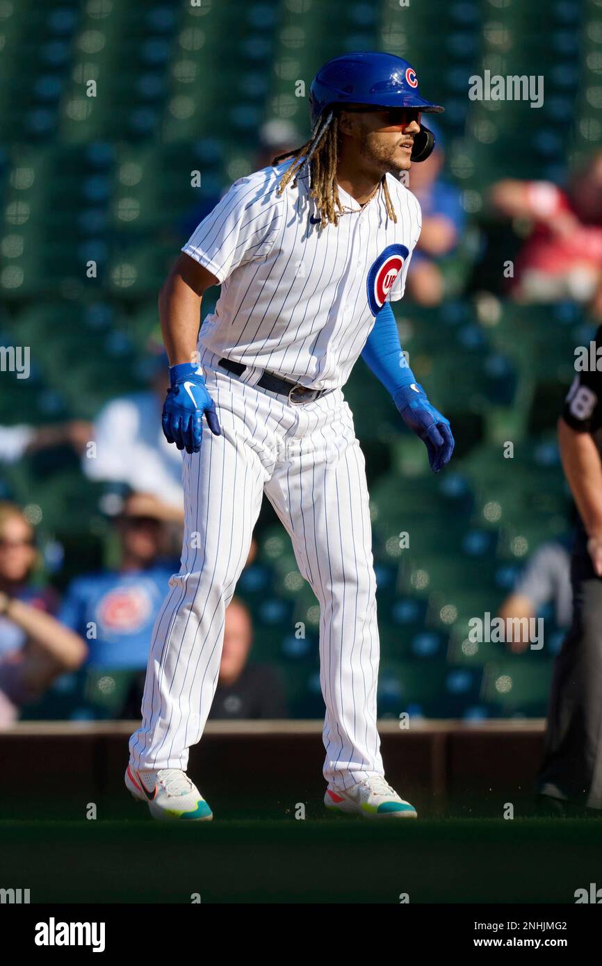 Chicago Cubs pinch runner Michael Hermosillo (37) leads off first base  during a Major League Baseball game against the Cincinnati Reds on  September 8, 2022 at Wrigley Field in Chicago, Illinois. (Mike