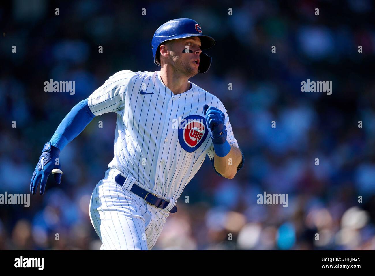 Chicago Cubs Nico Hoerner (2) runs to first base during a Major