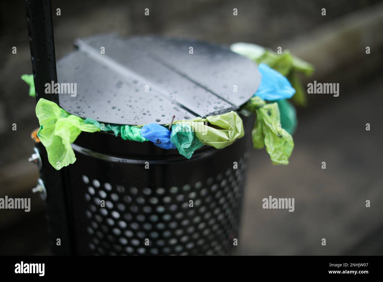 Trash in public street showing littering dumped not recycled Stock