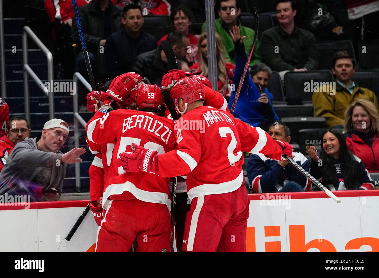 Detroit Red Wings players celebrate a goal by Robert Hagg (38) during
