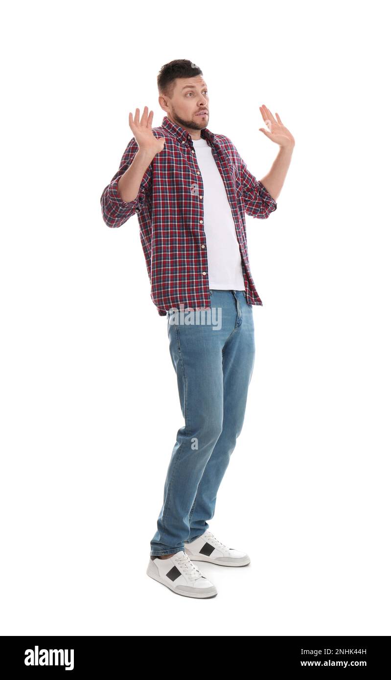 Emotional man avoiding something on white background Stock Photo