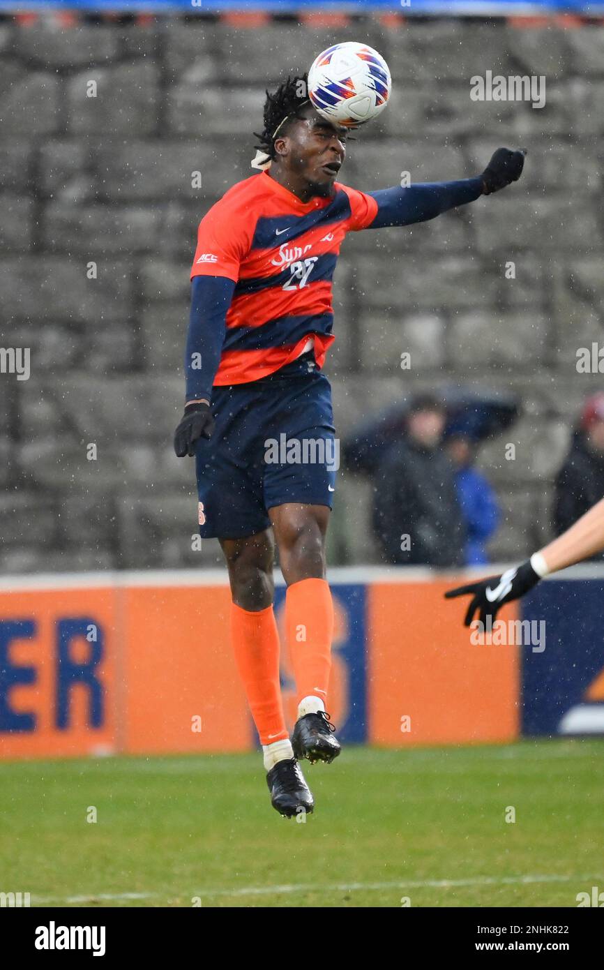 November 27, 2022: Cornell Big Red defender Andrew Johnson (29) heads the  ball against the Syracuse Orange during a third round match of the 2022  NCAA Men's Division I Soccer Championship on