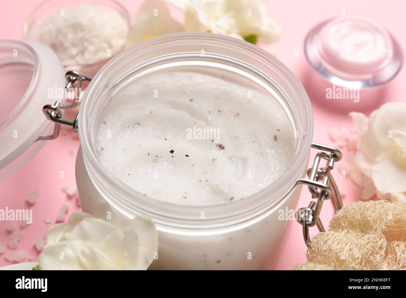Body scrub in glass jar on pink background, closeup Stock Photo Alamy
