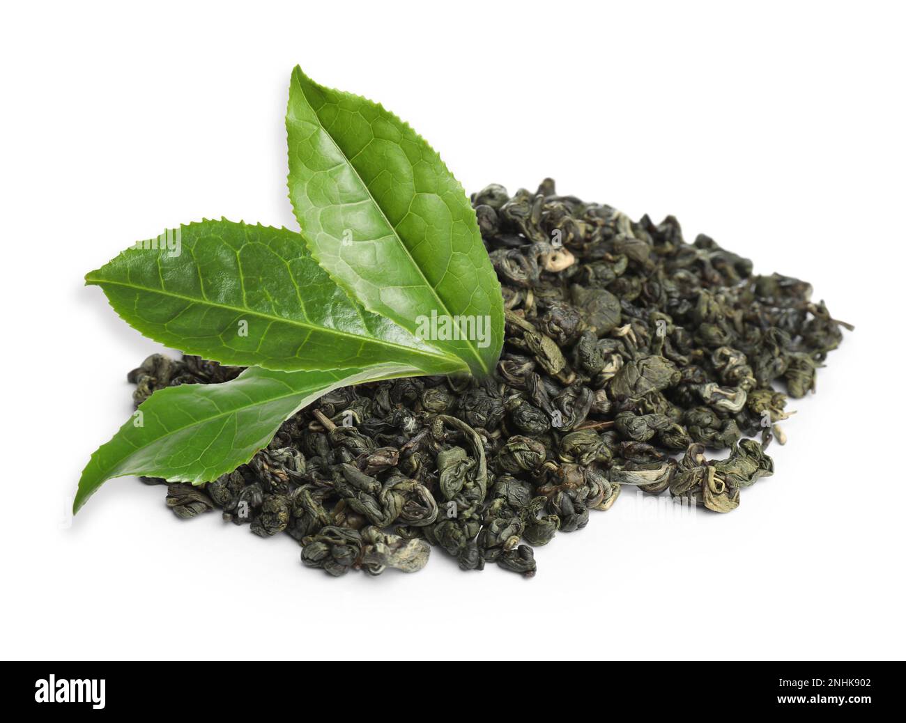 Dry green tea and fresh leaves on white background Stock Photo - Alamy