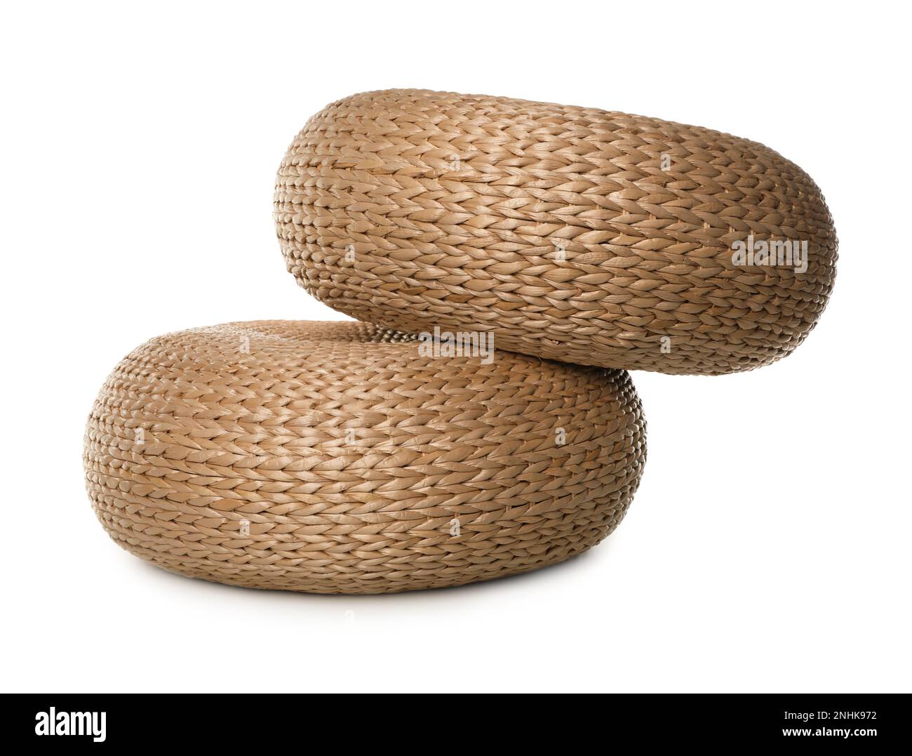 Two stylish wicker poufs on white background Stock Photo