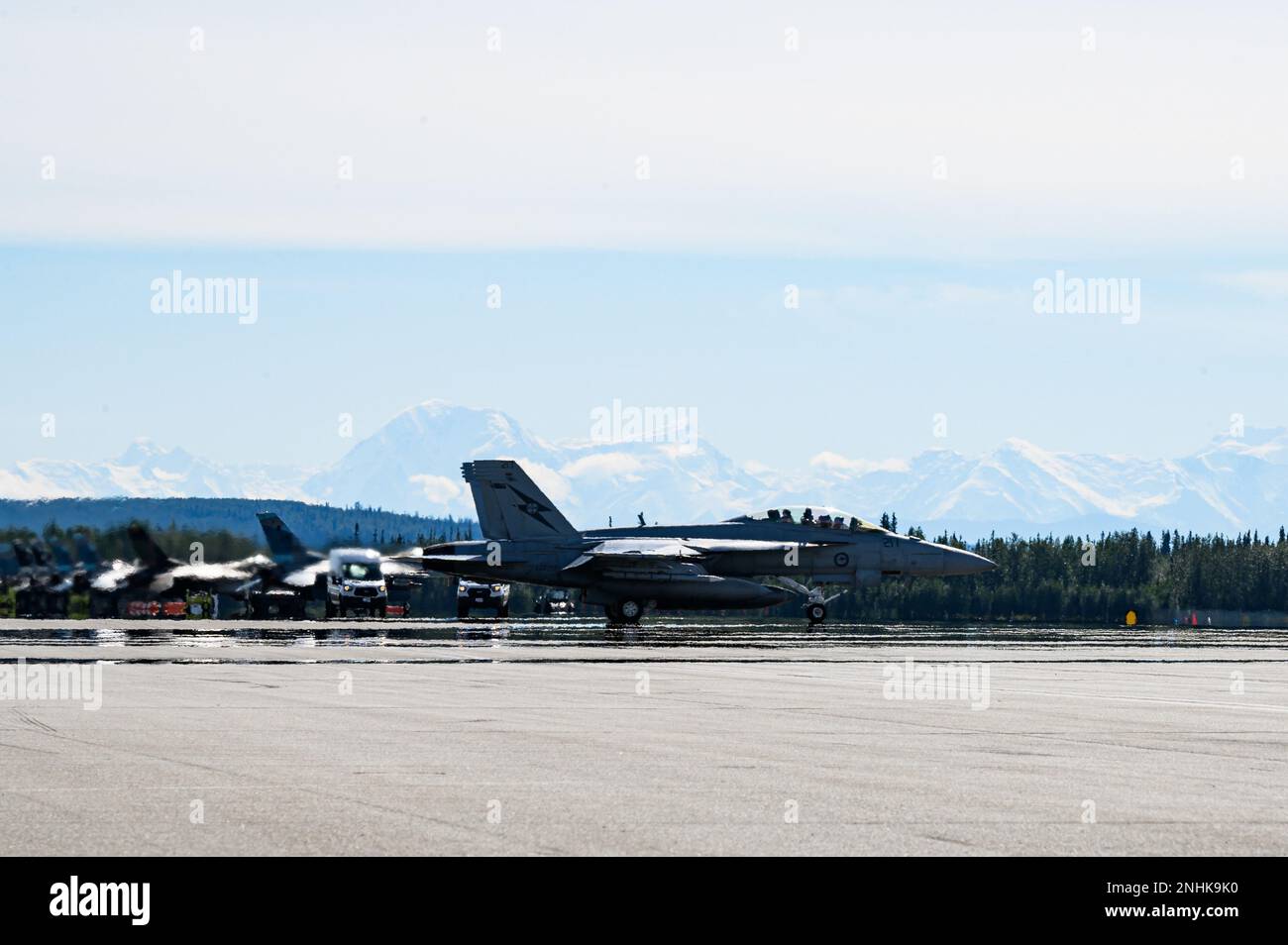 A Royal Australian Air Force F/A-18F Super Hornet taxis on the runway during RED FLAG-Alaska 22-3 on Eielson Air Force Base, Alaska, July 29, 2022. RF-A 22-3 is a Pacific Air Forces-sponsored exercise designed to provide realistic training in a simulated combat environment. Stock Photo