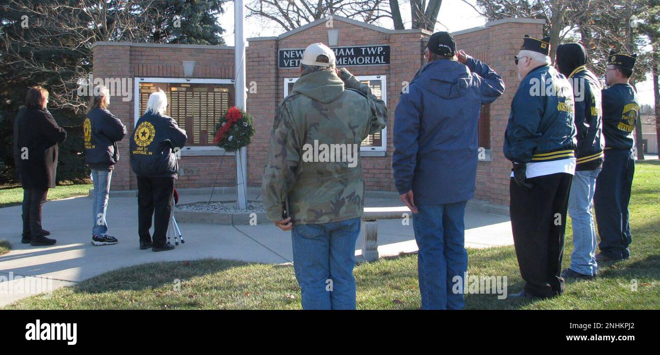 American Legion and Auxiliary members of Post 21 pay their respects to