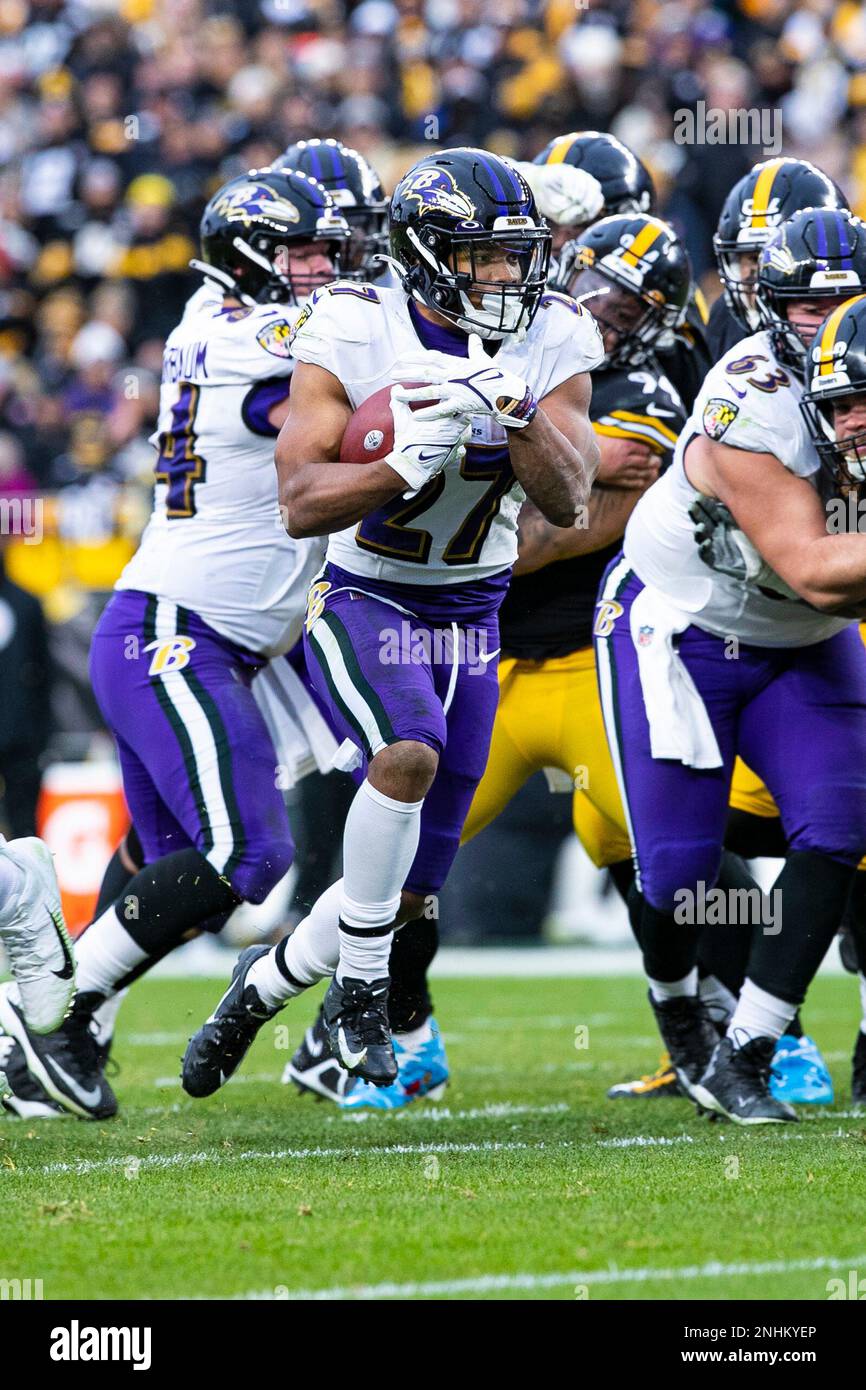 PITTSBURGH, PA - DECEMBER 11: Baltimore Ravens running back J.K. Dobbins  (27) runs with the ball during the national football league game between  the Baltimore Ravens and the Pittsburgh Steelers on December
