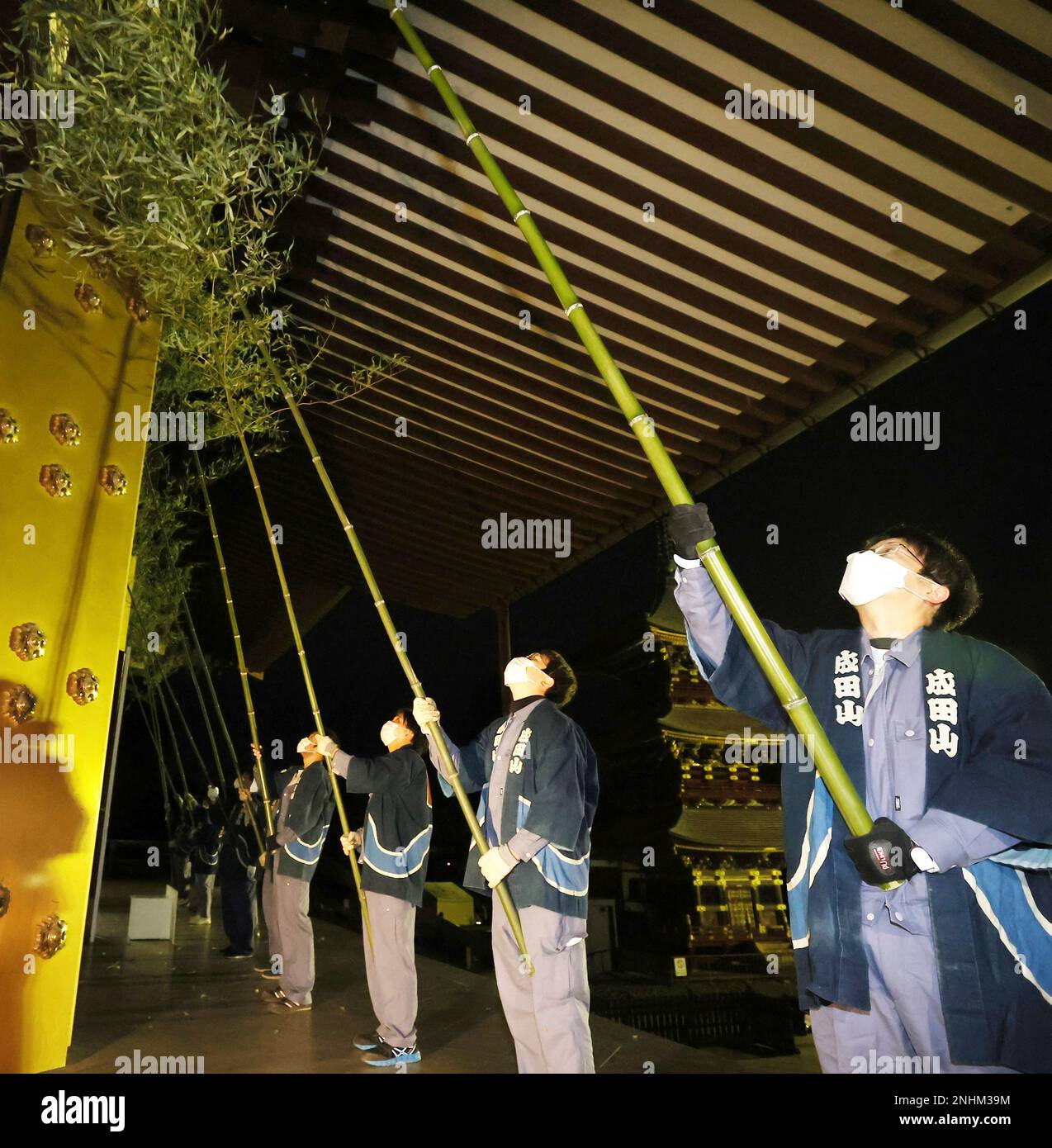 Soot Rituals Temple apprentices and staffs get rid of dust by bamboo broom under the ...