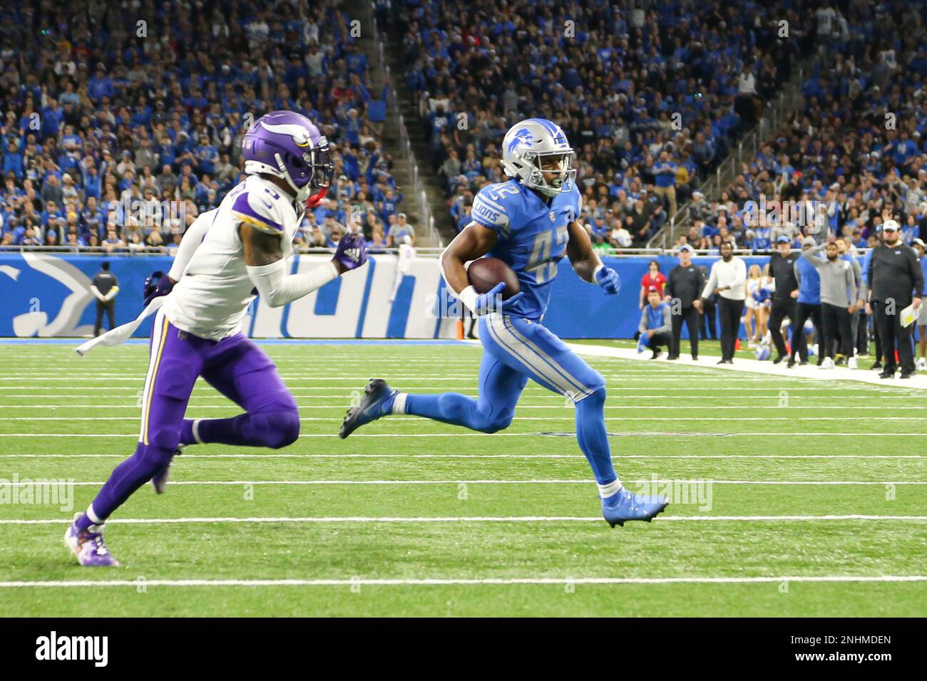 DETROIT, MI - DECEMBER 5: Minnesota Vikings WR (18) Justin Jefferson goes  up high to catch a pass with Detroit Lions CB Jerry Jacobs (39) during NFL  game between Minnesota Vikings and