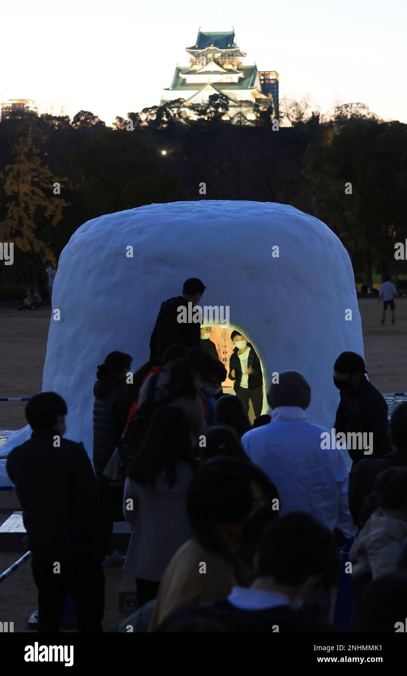 Visitors enjoy staying inside a kamakura, snow dome at Osaka Castle