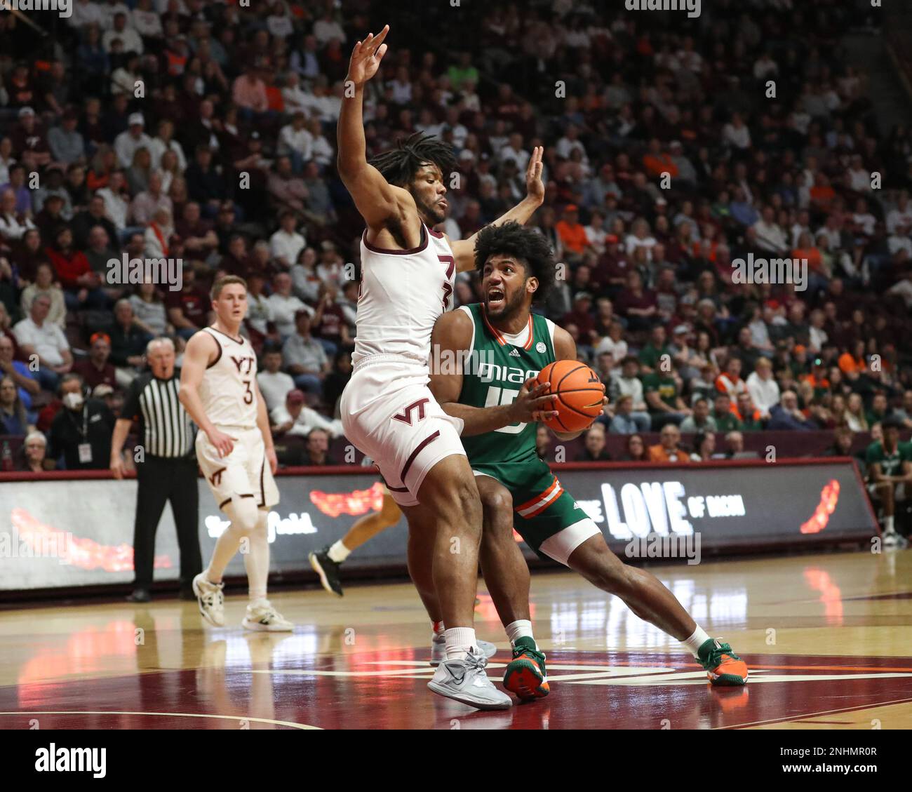 Blacksburg, Virginia, USA. 21st Feb, 2023. Miami (Fl) Hurricanes forward Norchad Omier (15) looks to score in the paint against Virginia Tech Hokies forward Mylyjael Poteat (34) during the NCAA Basketball game between the Miami Hurricanes and the Virginia Tech Hokies at Cassell Coliseum in Blacksburg, Virginia. Greg Atkins/CSM/Alamy Live News Stock Photo