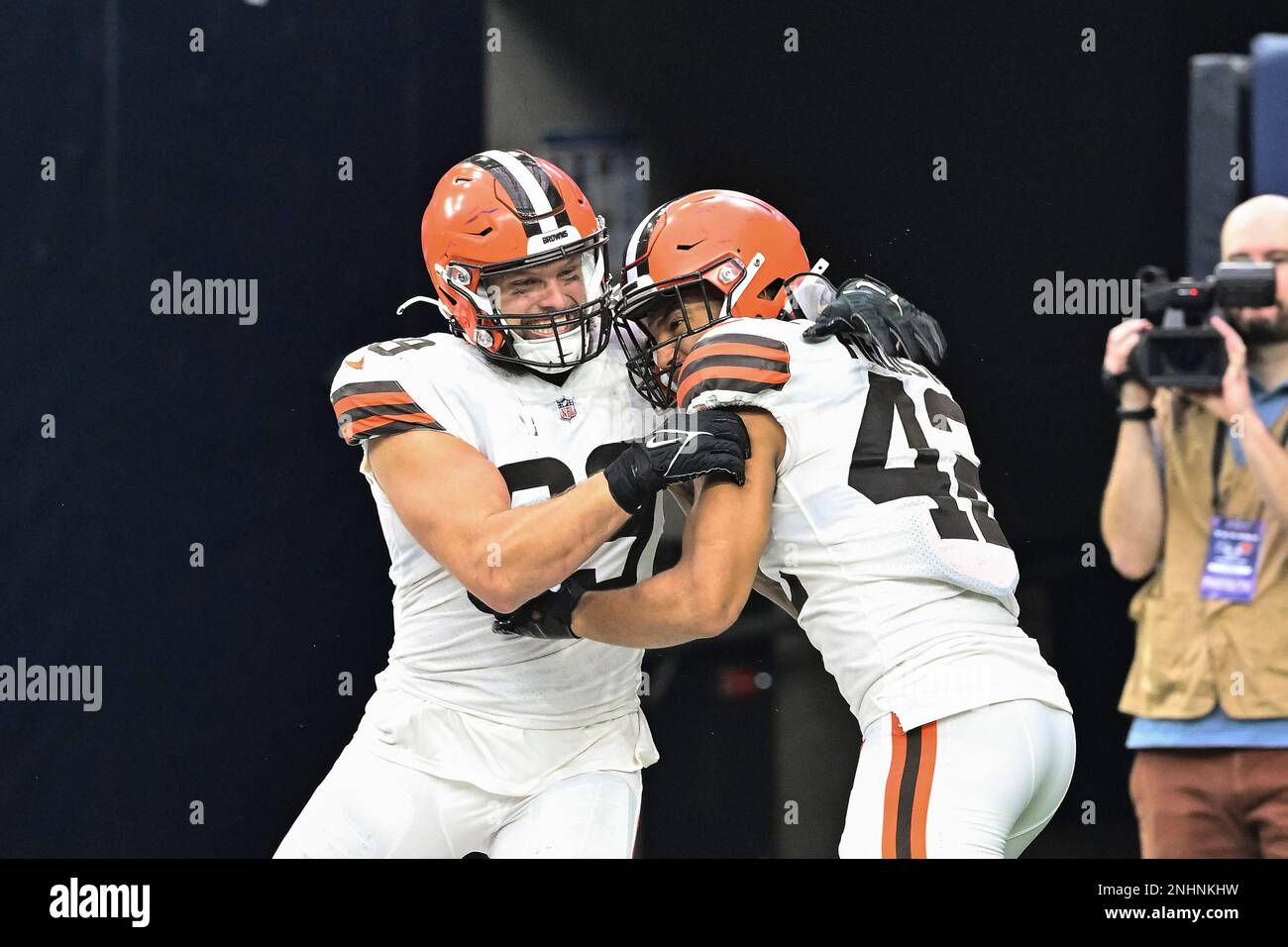 December 4, 2022, Houston, Texas, USA: Cleveland Browns defensive end Chase  Winovich (69) and linebacker Tony Fields II (42) celebrate during the  fourth quarter against the Houston Texans at NRG Stadium. Mandatory