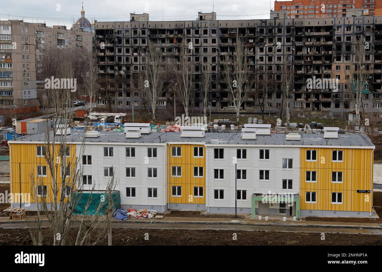 A view shows a newly built apartment block, in the course of the Russia-Ukraine conflict in Mariupol, Russian-controlled Ukraine, February 15, 2023. REUTERS/Alexander Ermochenko TPX IMAGES OF THE DAY Stock Photo