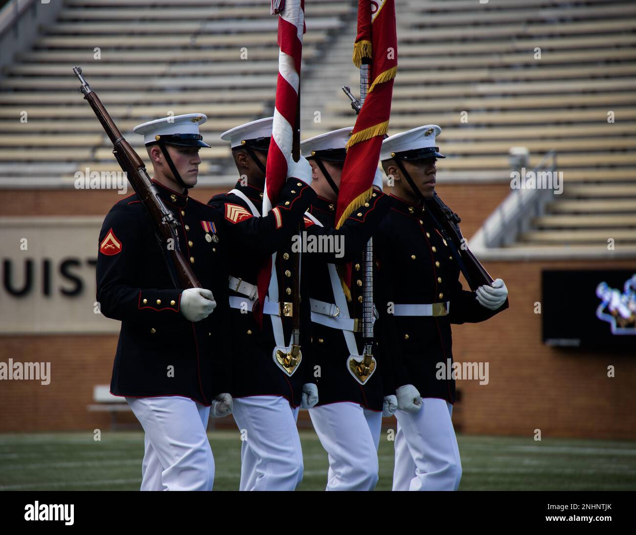 Marines with the Official U.S. Marine Corps Color Guard prepare to ...