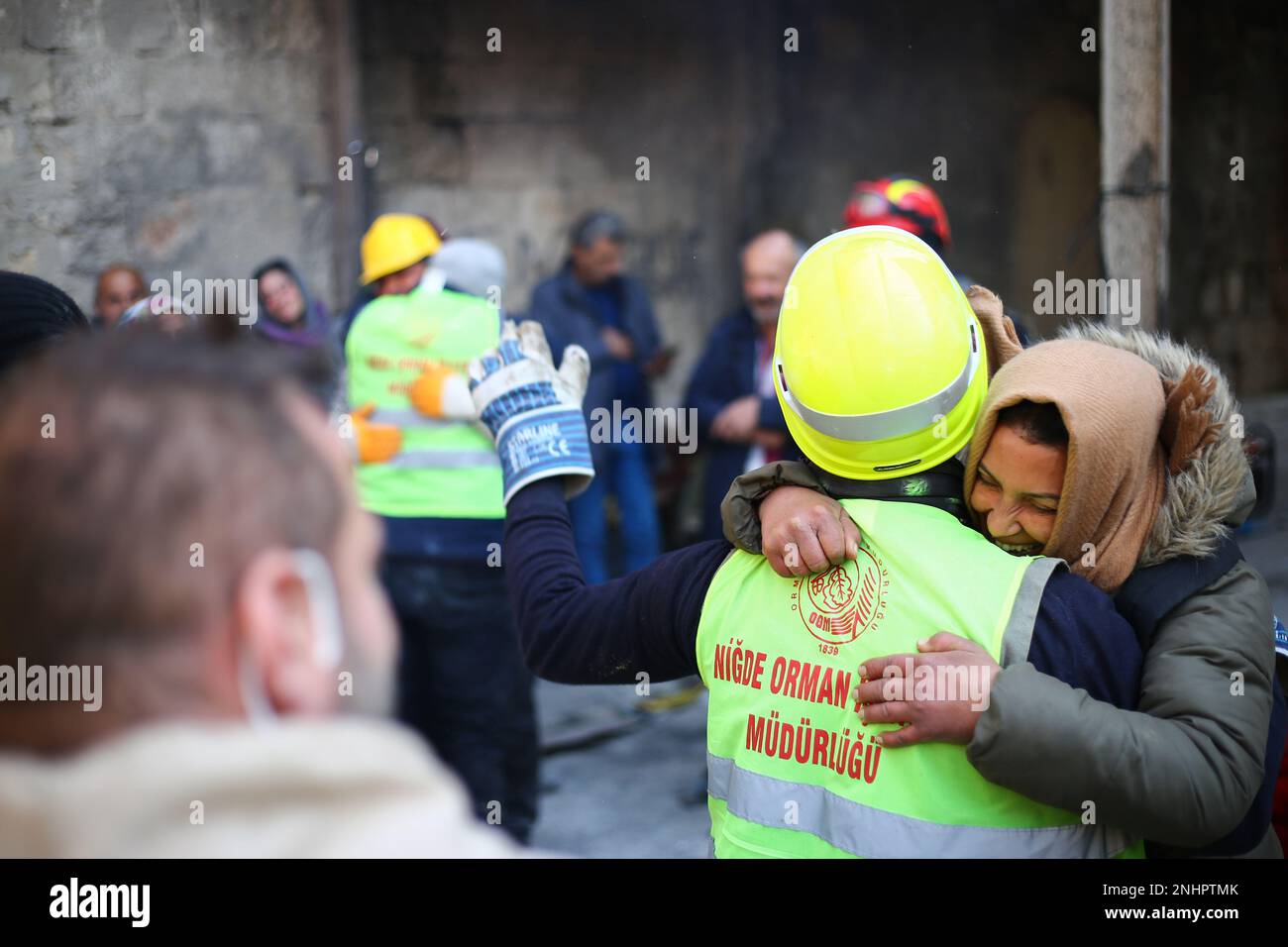Hatay, Turkey. 10th Feb, 2023. A woman embraces a rescuer worker after 74-Year-Old Hatice Kaya is rescued at the 117th Hour of the Earthquake. (Credit Image: © Mehmet Malko/SOPA Images via ZUMA Press Wire) EDITORIAL USAGE ONLY! Not for Commercial USAGE! Stock Photo