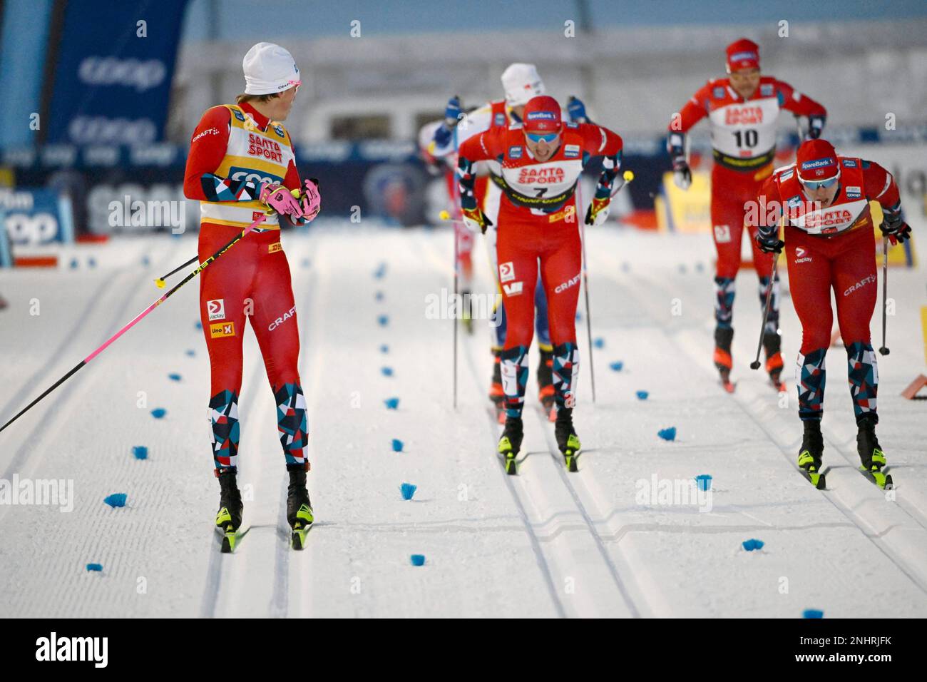 Norway's Johannes Hoesflot Klaebo, left, looks back as he competes during a  heat of the men's cross-country skiing classic style sprint finals, at the  Cross-Country Skiing World Cup Ruka Nordic Opening event