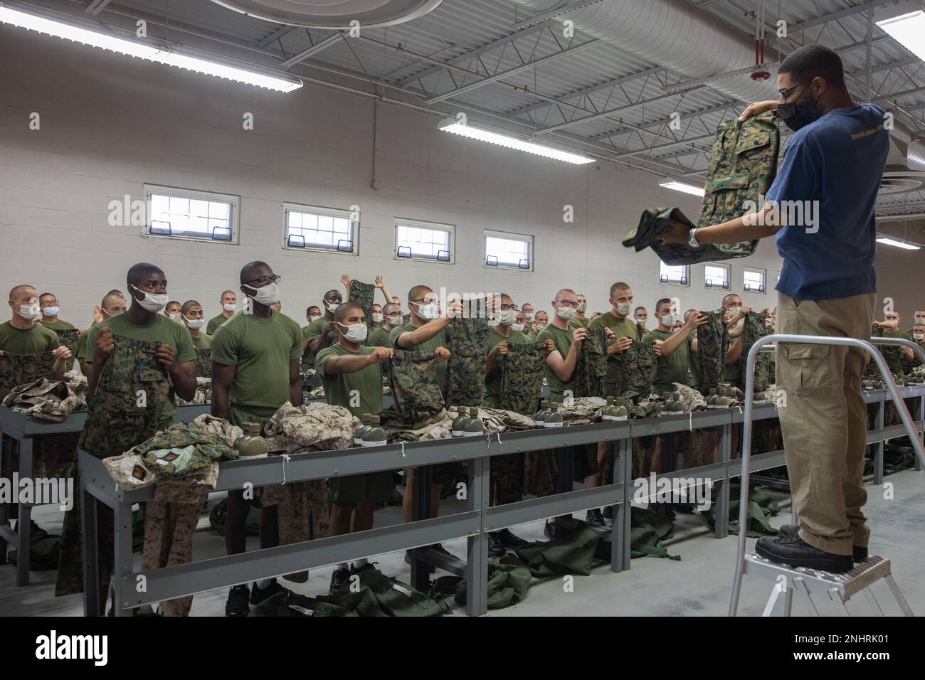 U.S. Marine Corps recruits with Charlie Company, 1st Recruit Training  Battalion, participate in an initial uniform fitting at Marine Corps  Recruit Depot San Diego, Aug. 2, 2022. Tailors checked measurements and  marked