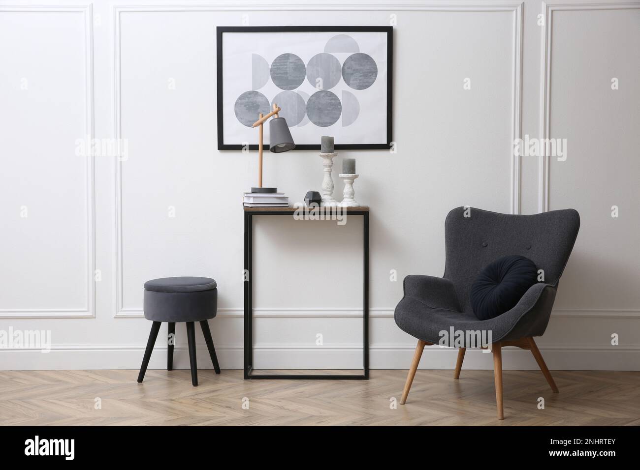 Hallway with stylish console table and armchair. Interior design Stock ...