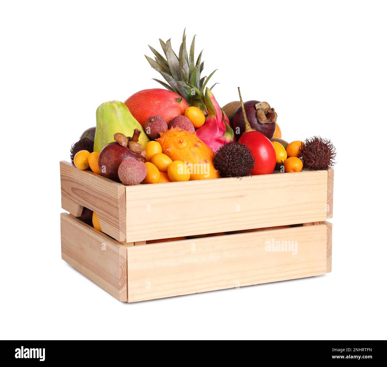 Wooden crate with different exotic fruits on white background Stock