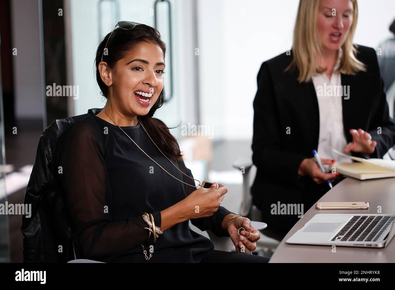 CEO and founder Deepa Sood (left) of Cuff meets with her ... - Alamy