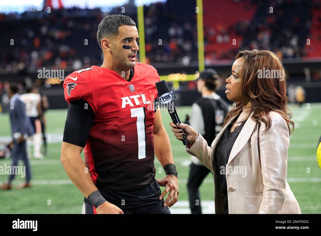 ATLANTA, GA - NOVEMBER 20: Fox Sports reporter Pam Oliver interviews  Atlanta Falcons quarterback Marcus Mariota (1) after the Sunday afternoon  NFL game between the Chicago Bears and the Atlanta Falcons on