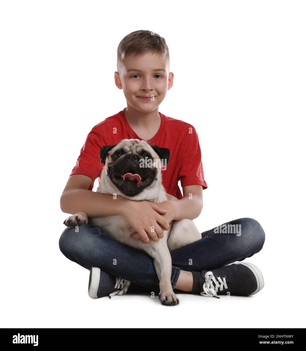 Boy with his cute pug on white background Stock Photo - Alamy
