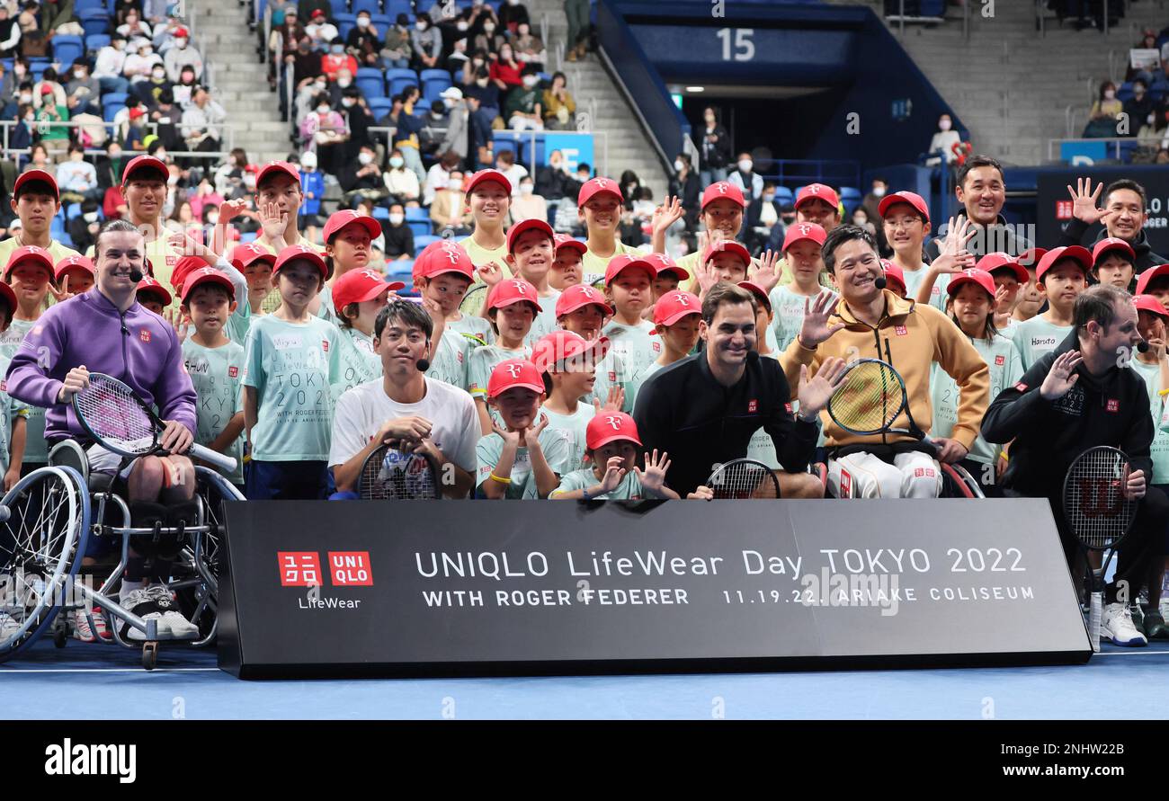 Swiss Roger Federer poses with Japanese kids during the event " UNIQLO  LifeWear Day Tokyo 2022 with Roger Federer" at Ariake Coliseum in Koto  Ward, Tokyo on Nov. 19, 2022.. 41-year-old Swiss