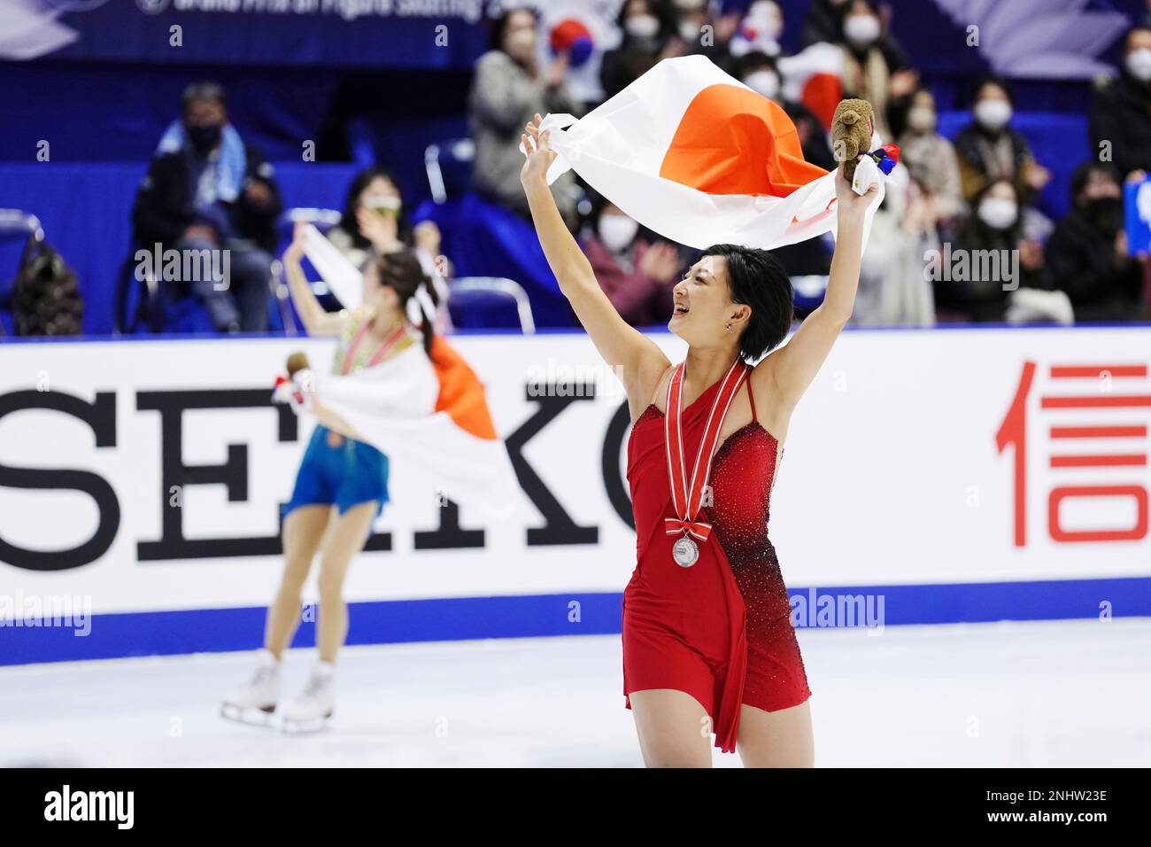Japans Kaori Sakamoto (R) and Rion Sumiyhoshi celebrate after perfoming a womens free skating of the NHK Trophy at Makomanai Sekisui Heim Ice Arena in Sapporo, Hokkaido Prefecture on Nov
