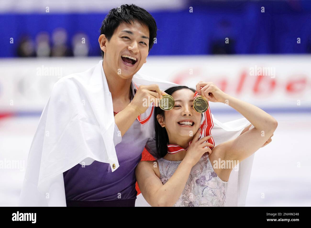 Japans Riku MIURA (R) and Ryuichi KIHARA show their gold medal after winning their first Pair Free Skating of NHK Trophy at Makomanai Sekisui Heim Ice Arena in Sapporo, Hokkaido Prefecture on