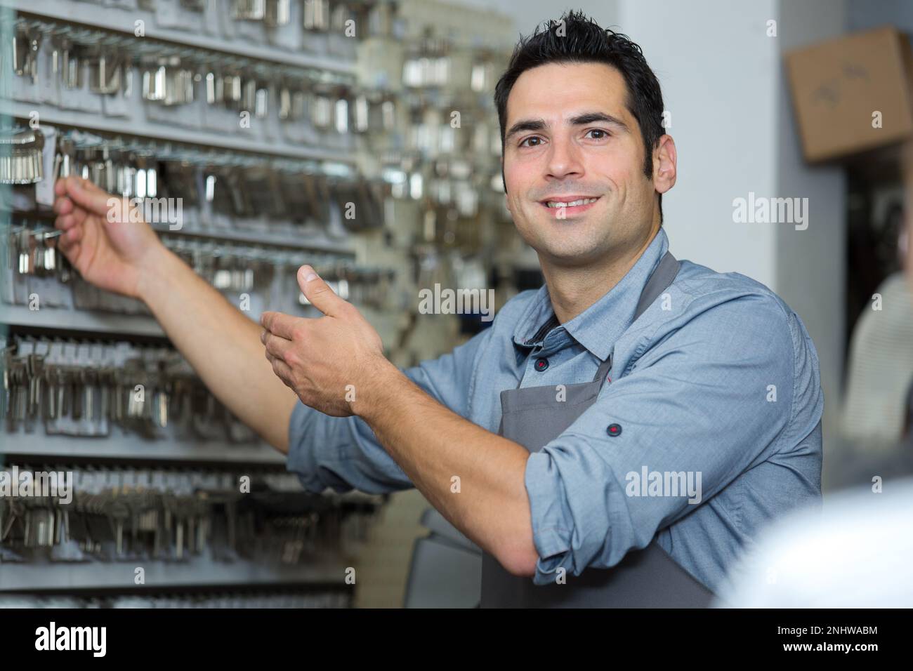 a happy professional key maker Stock Photo Alamy
