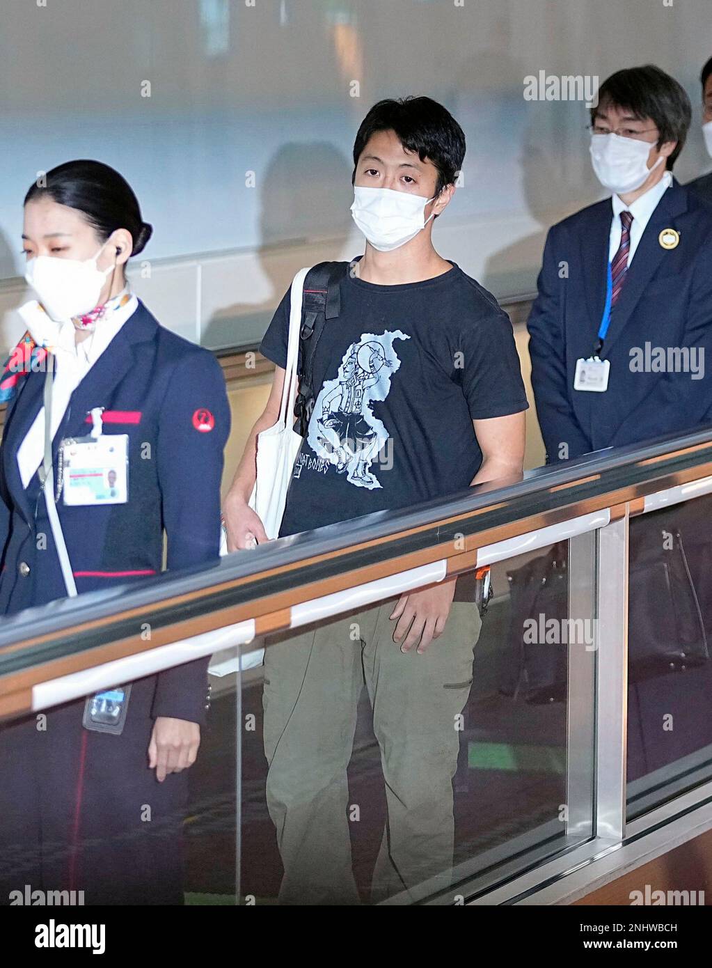 Japanese Toru Kubota arrives at Haneda international airport in Tokyo