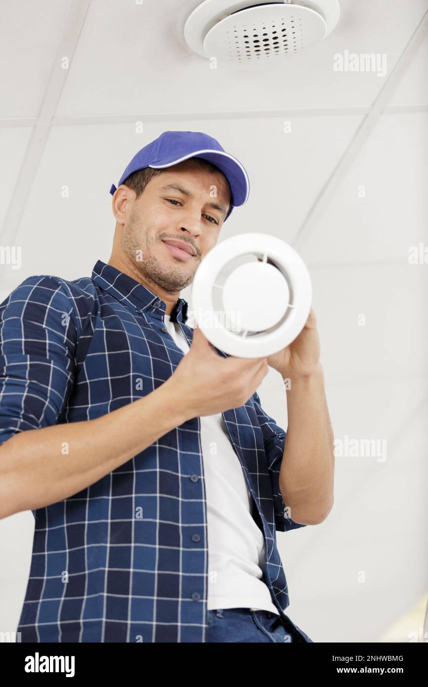 cleaning ceiling air ventilation fan Stock Photo Alamy