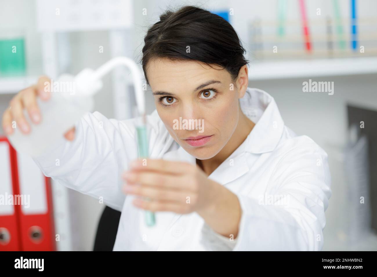 woman working with pipettes and tubes Stock Photo Alamy