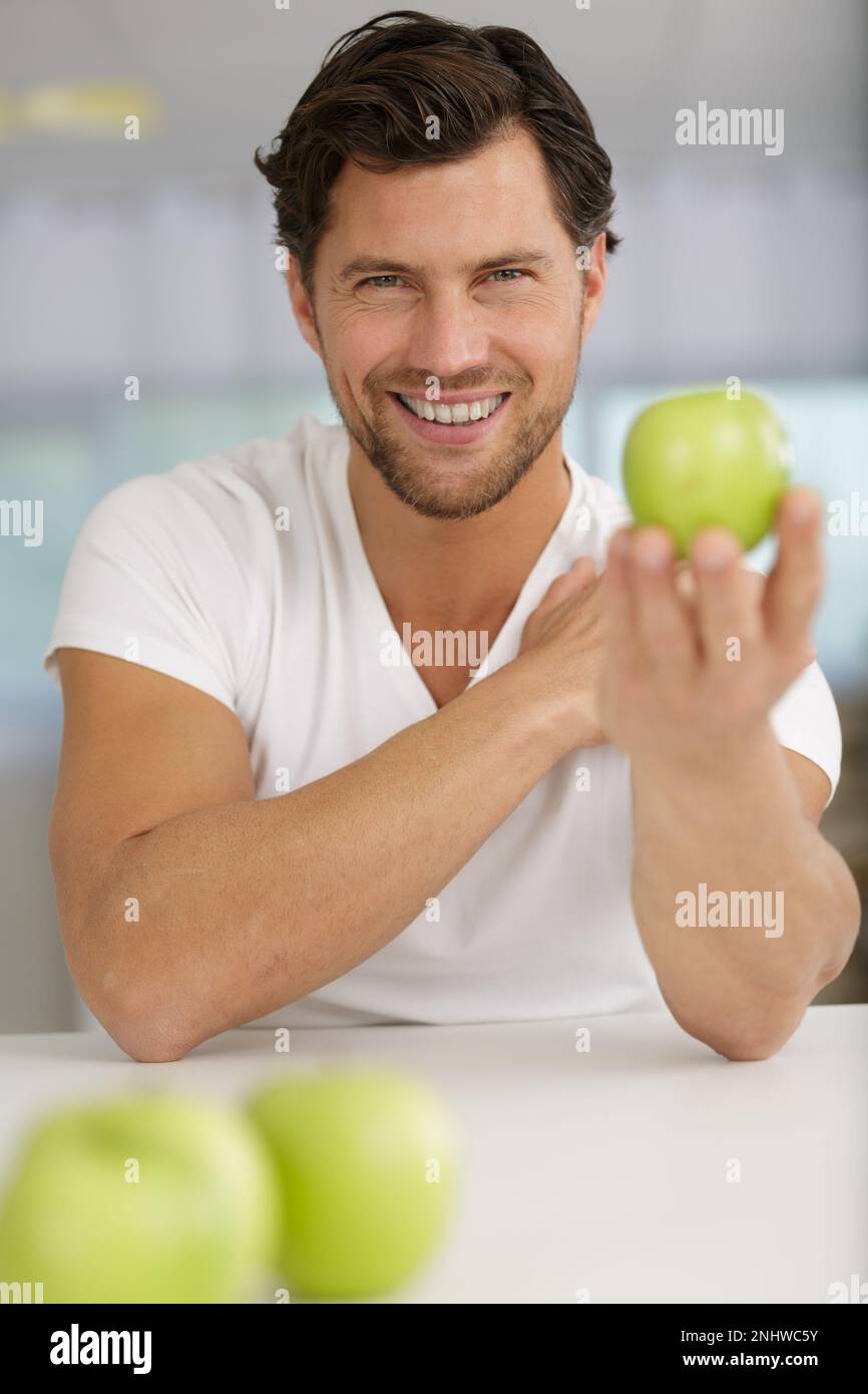 happy man with apples Stock Photo