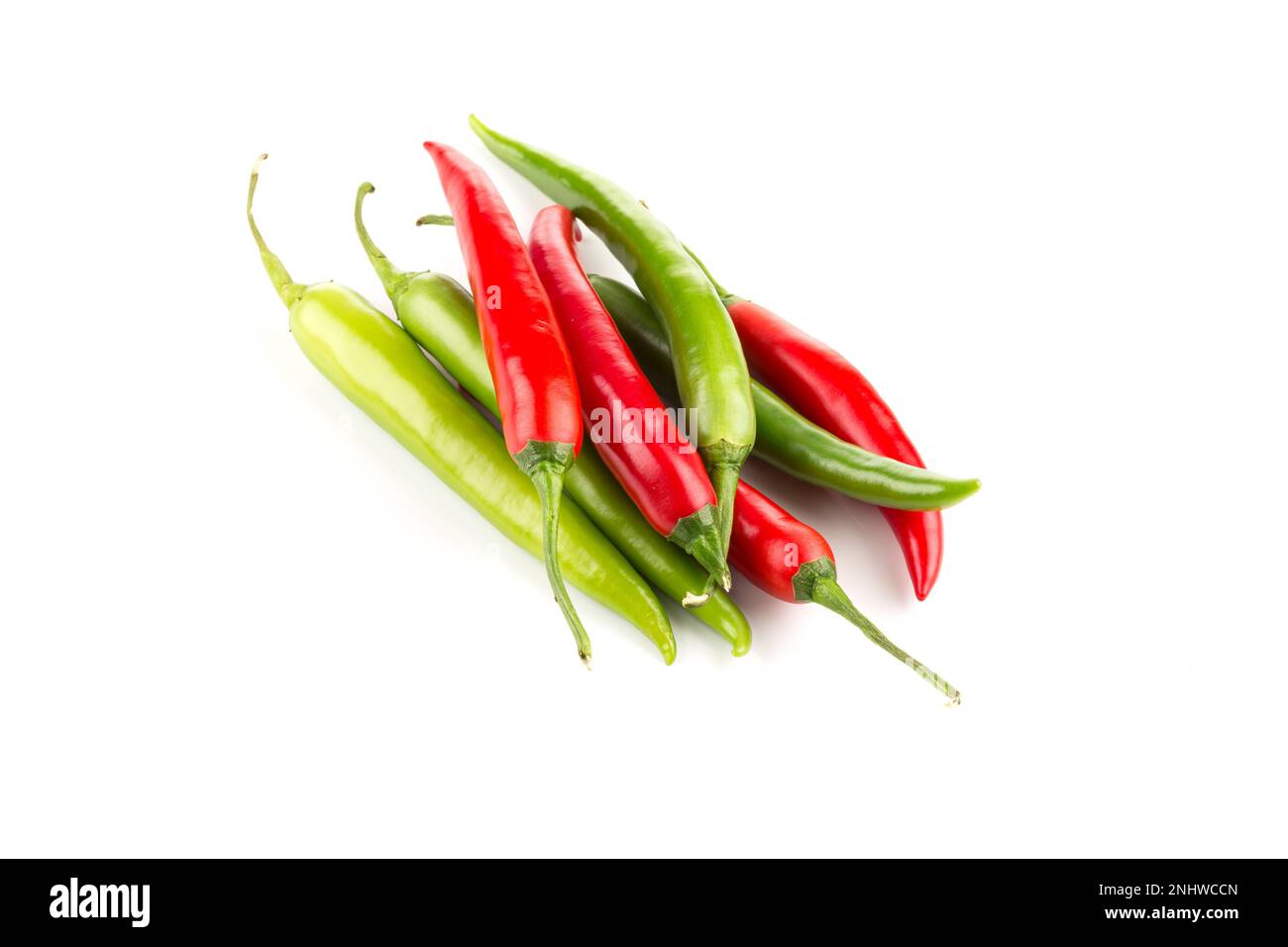 Green and red chili pepper isolated on white background Stock Photo - Alamy