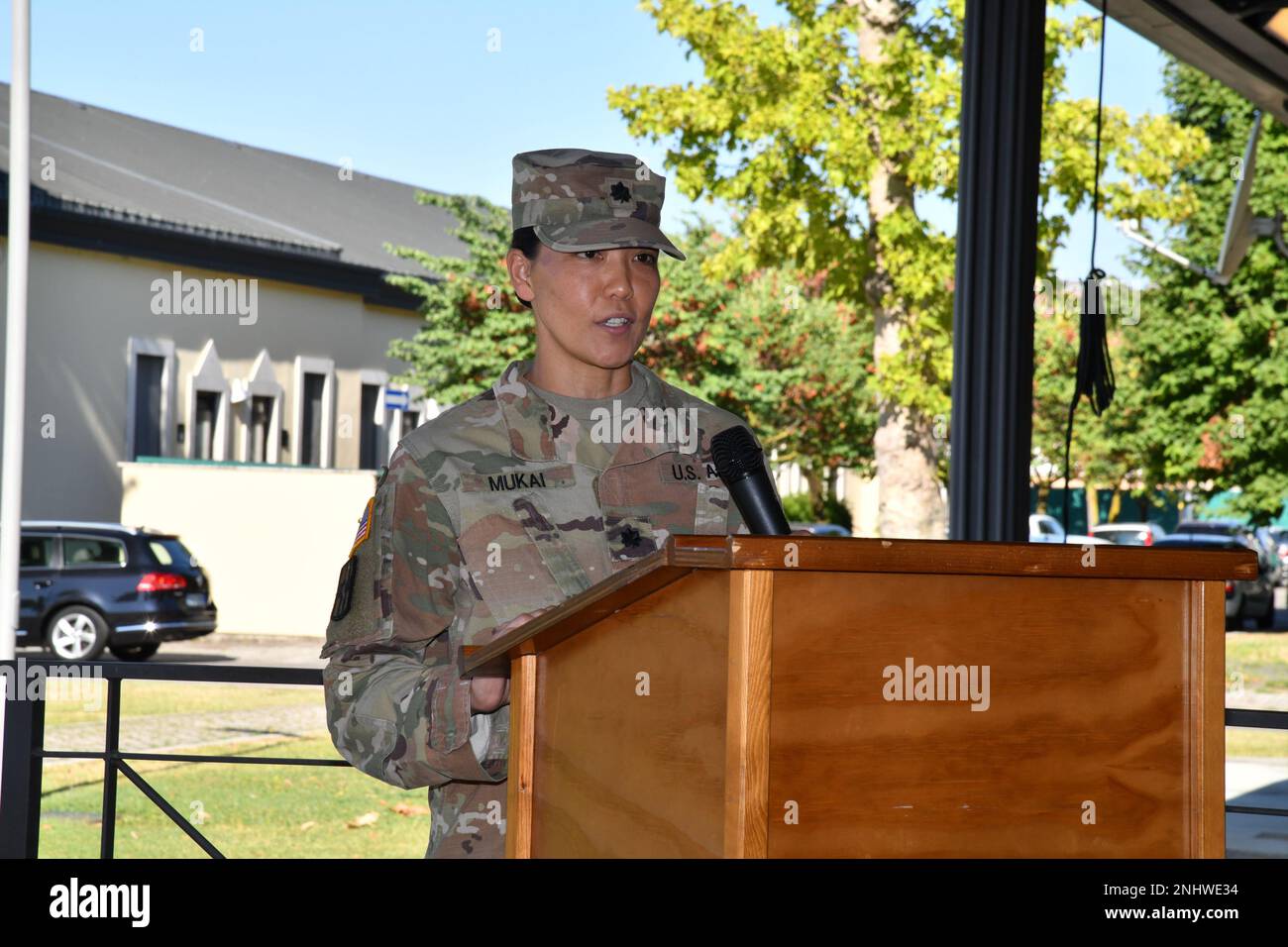 U.S. Army Lt. Col. Serena T. Mukai, the incoming Commander Public Health Activity - Italy, addresses the audience during change of command ceremony at Caserma Ederle in Vicenza, Italy, August 3, 2022. Stock Photo