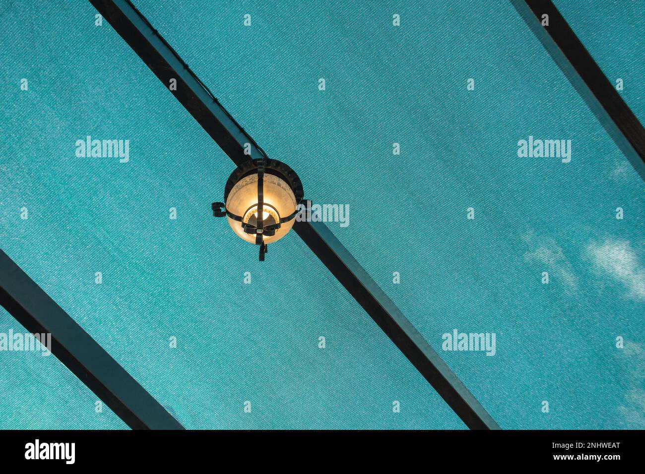 Lamp shade on a pergola Stock Photo Alamy
