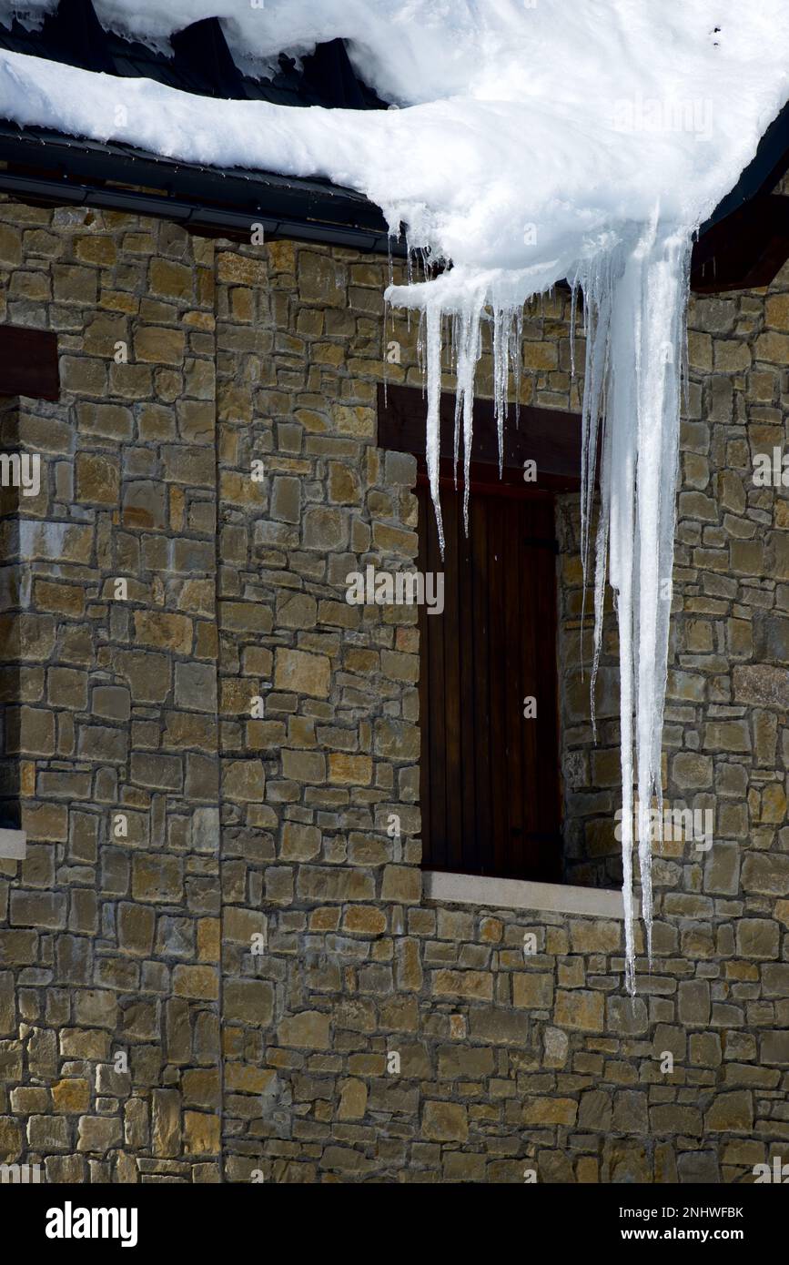 Ice icicles in a building at the Panticosa village in the Spanish