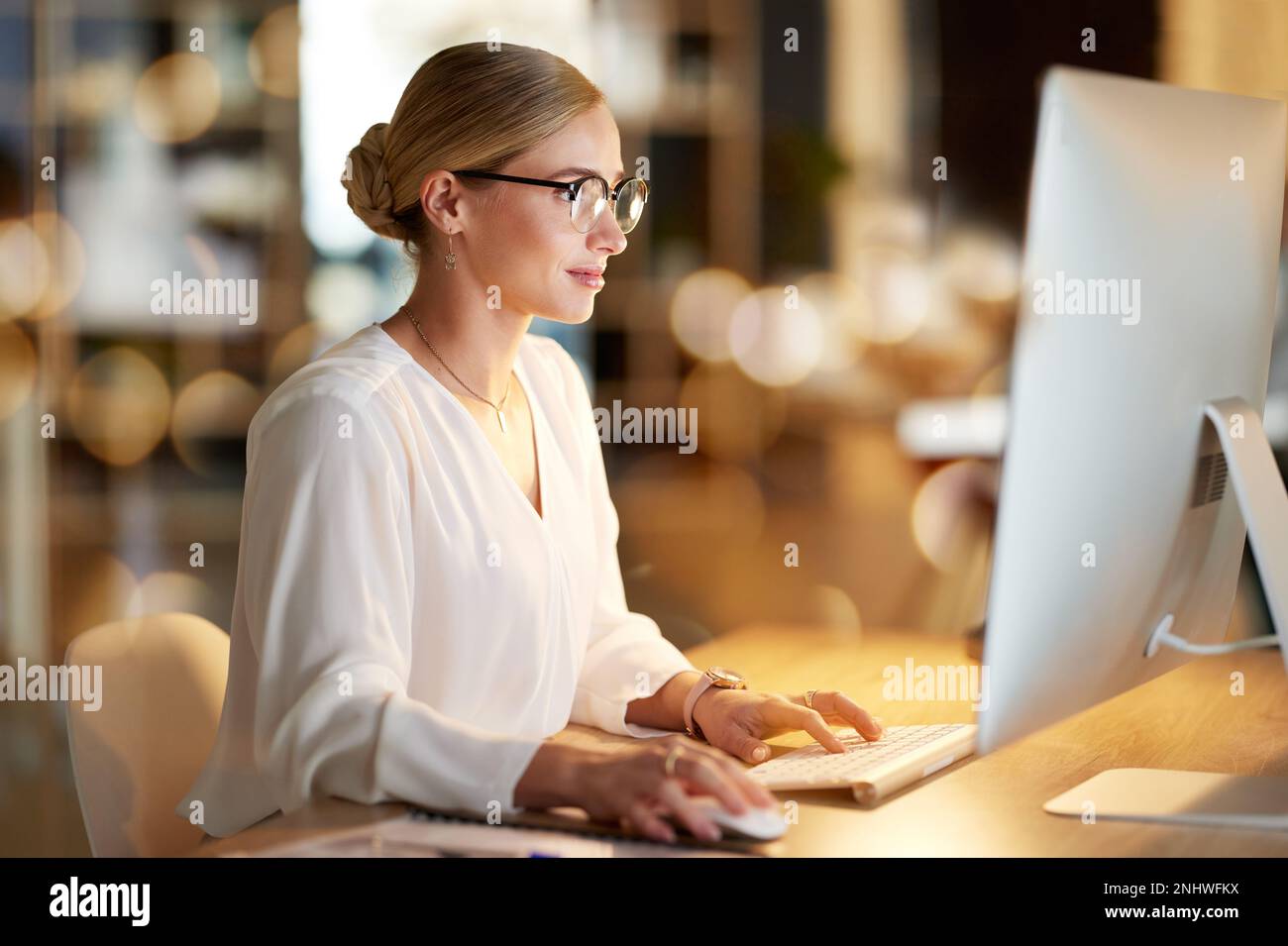 Serious, research and woman on a computer for email, software development and programming. Web design, database and employee working on coding Stock Photo