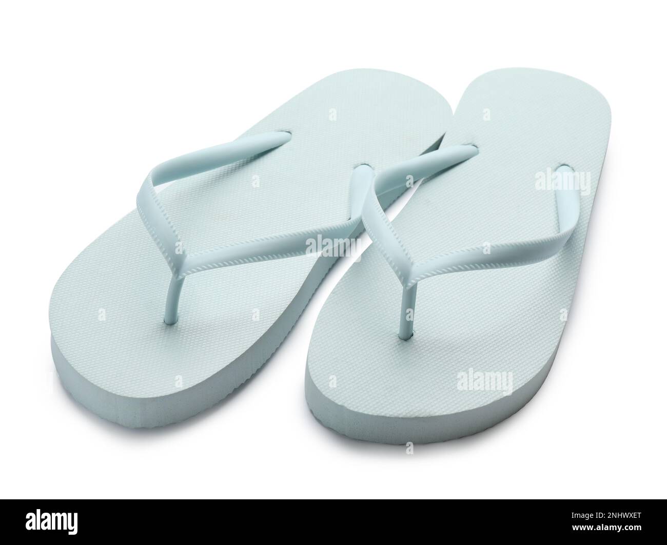 Stylish light blue flip flops on white background. Beach object Stock ...