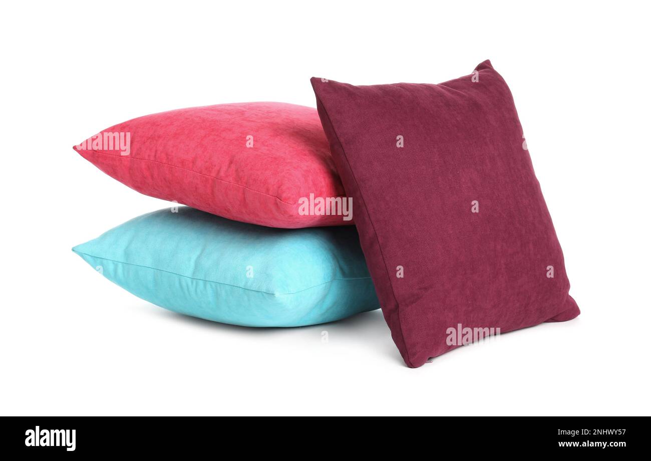 Different colorful decorative pillows on white background Stock Photo