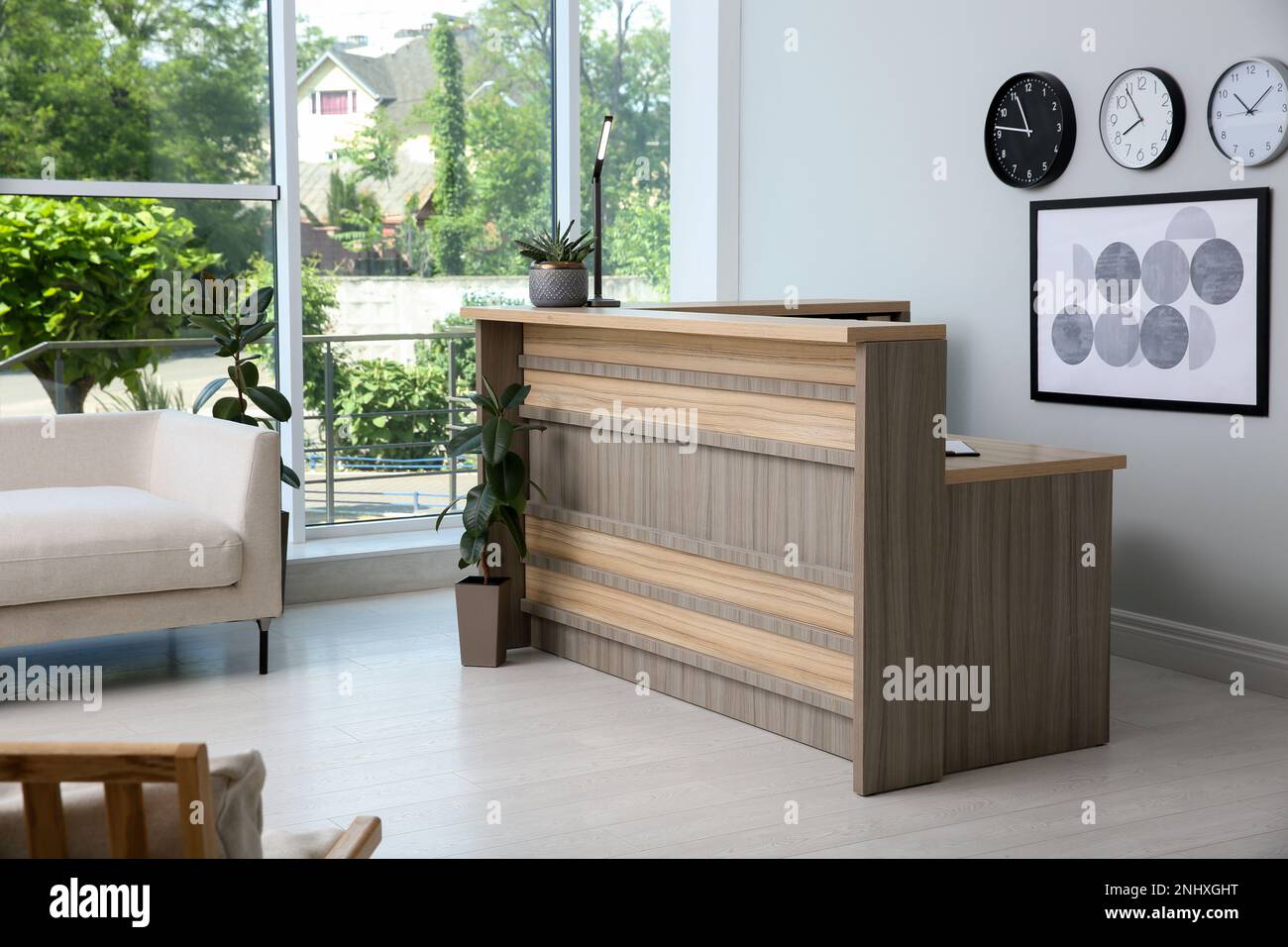 Lobby interior with stylish wooden receptionist desk Stock Photo Alamy