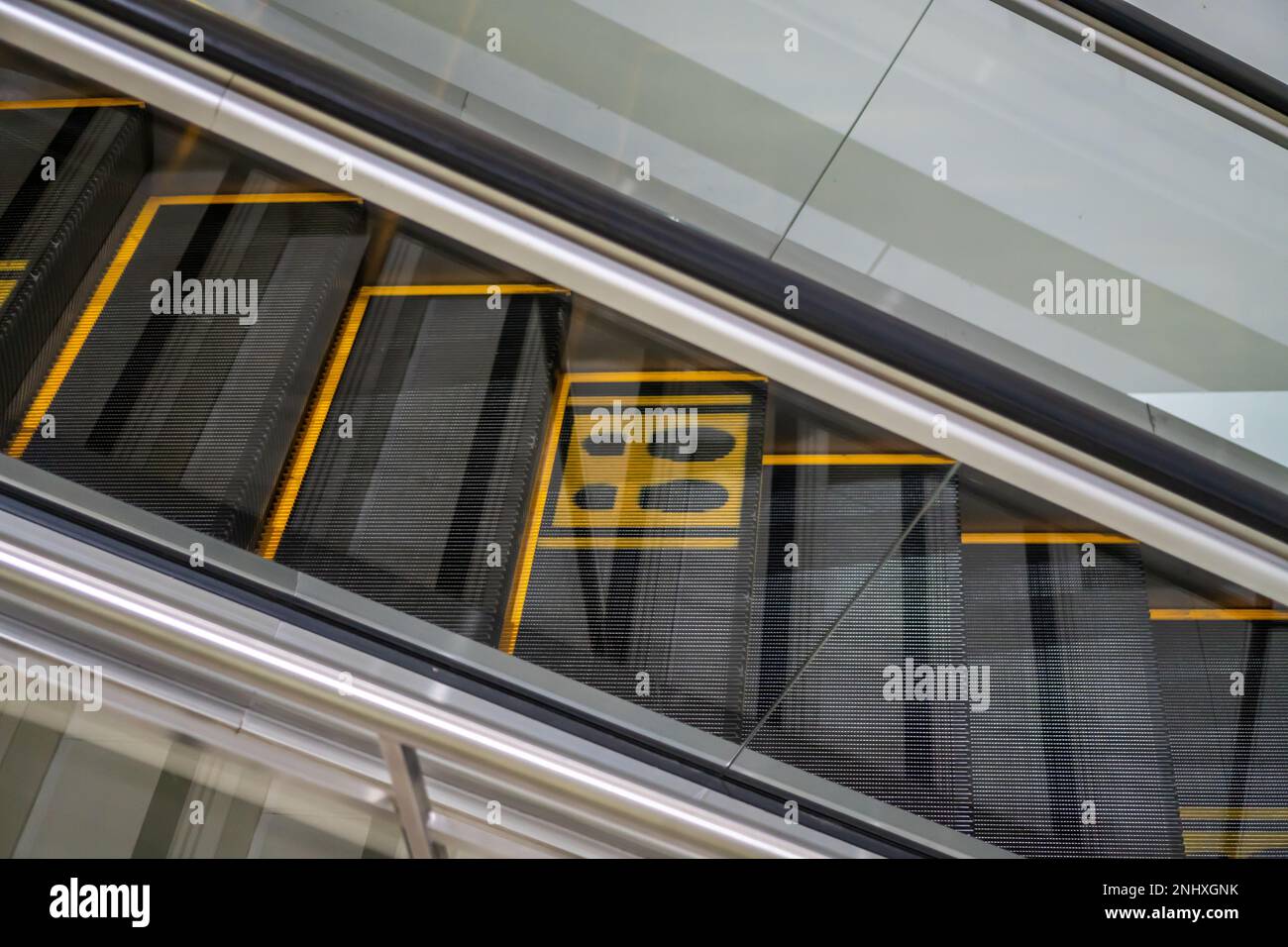 Escalator with color mask on stair for social distancing concept Stock ...