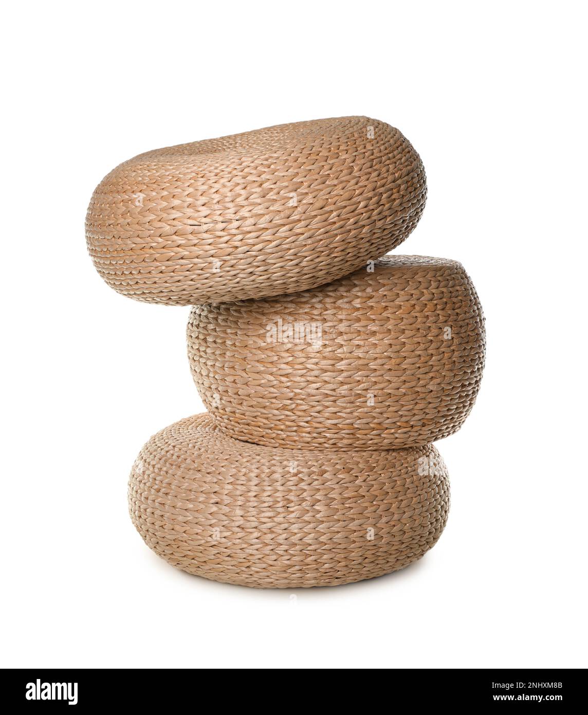 Three stylish wicker poufs on white background Stock Photo