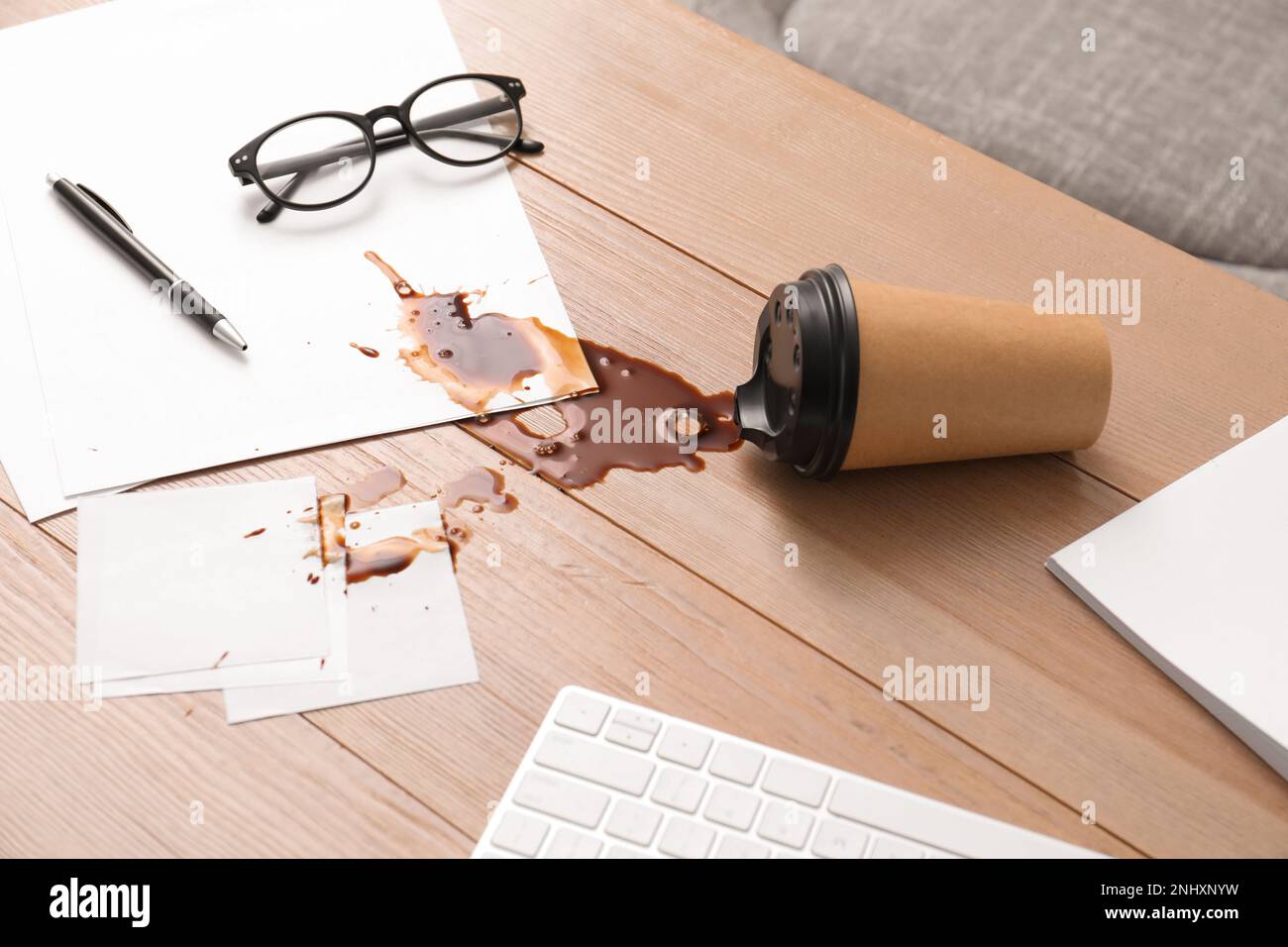Paper Cup With Coffee Spill On Wooden Office Desk Stock Photo Alamy paper-cup-with-coffee-spill-on-wooden-office-desk-stock-photo-alamy